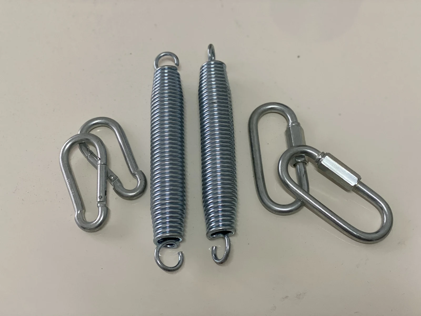 Replacement trampoline springs and metal attachment clips