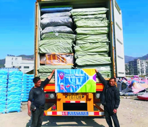 Wrapped playground components loaded in a shipping container