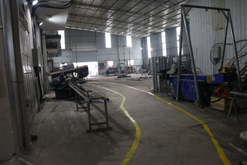 Metal fabrication workshop with manufacturing equipment